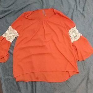 Orange flowy shirt
